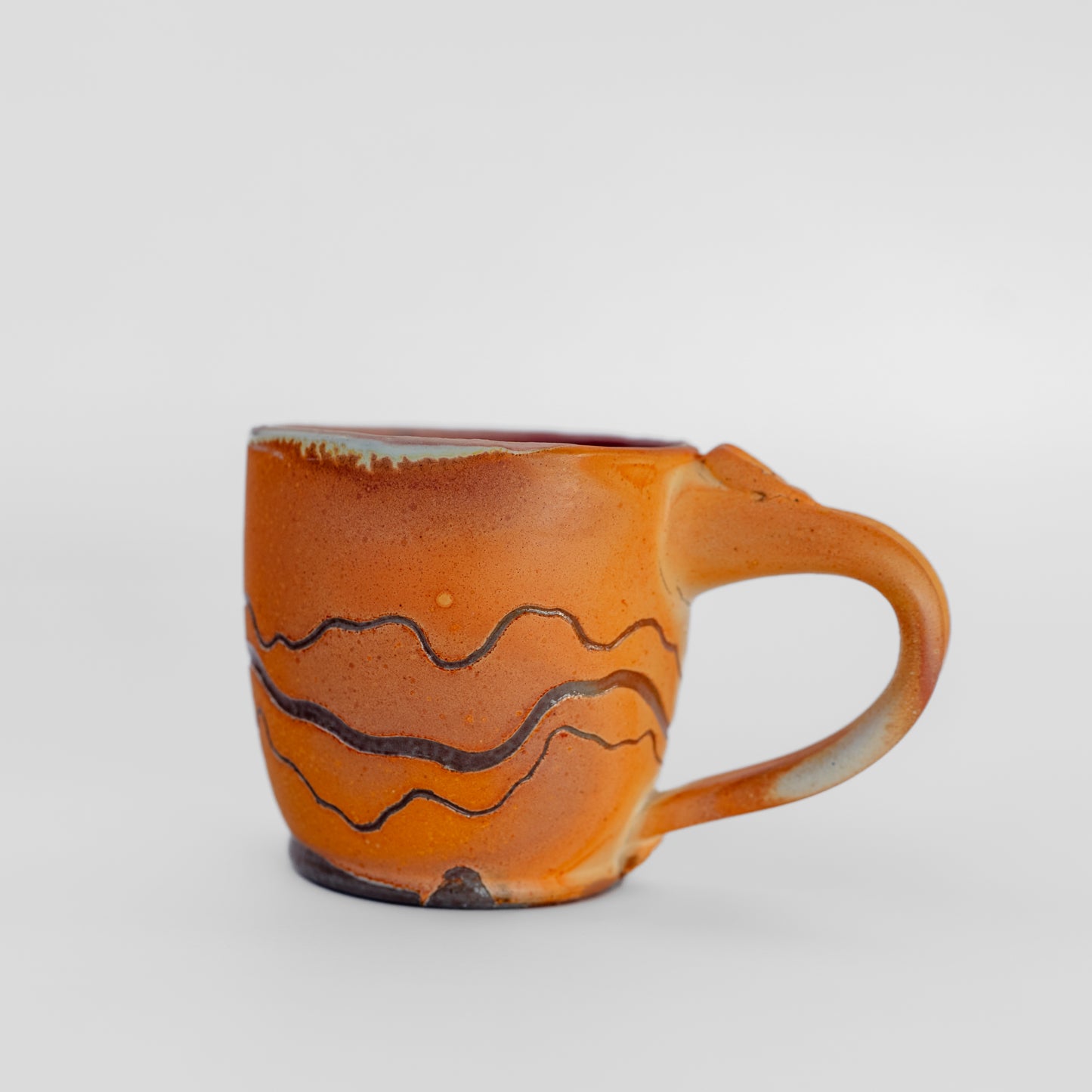 soda-fired sgraffito latte mug