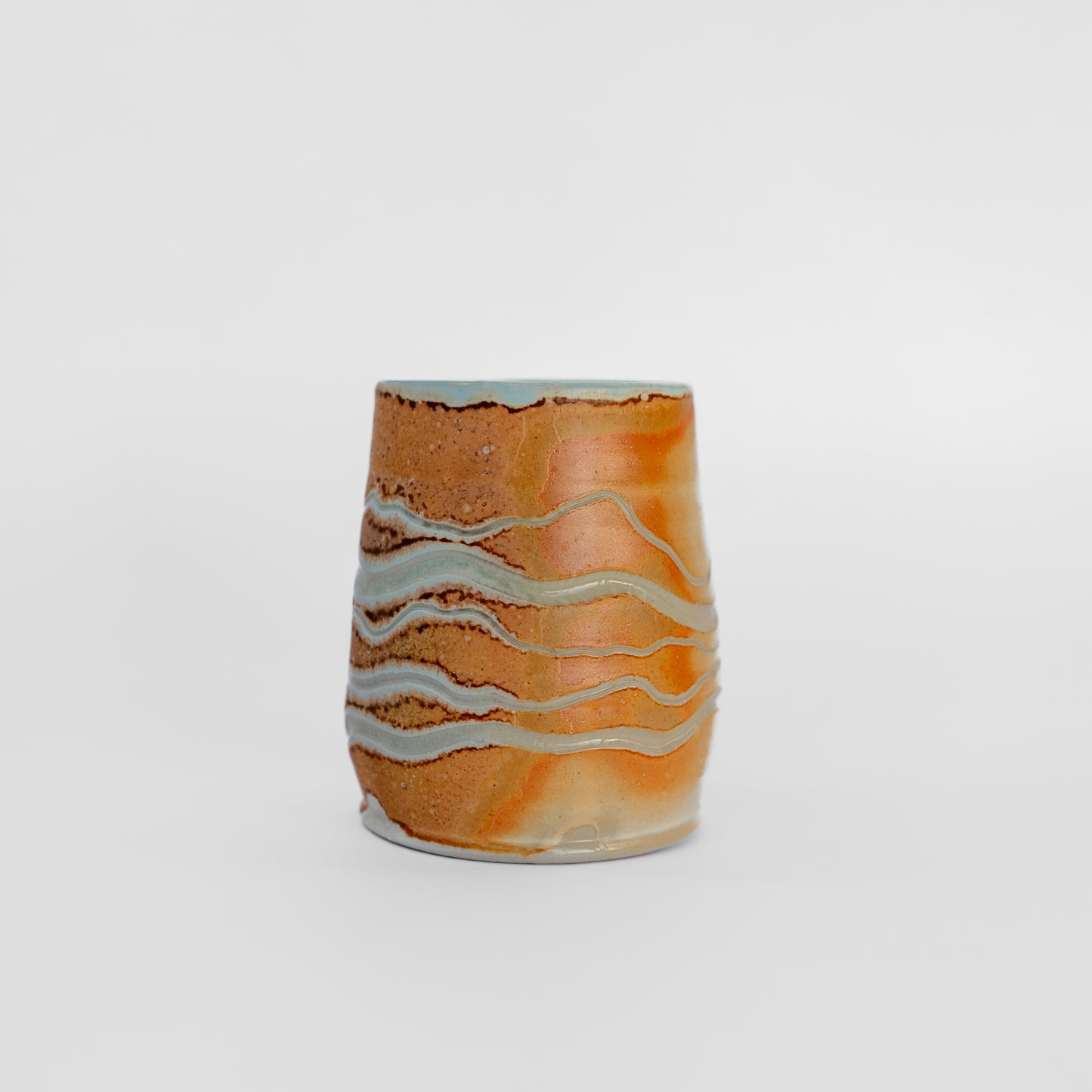 soda-fired sgraffito thumb tumbler