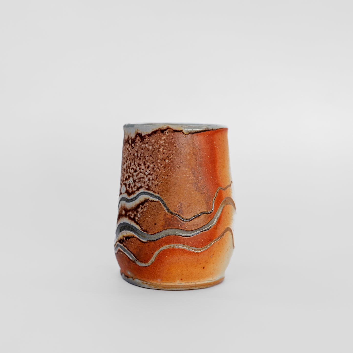 soda-fired sgraffito thumb tumbler