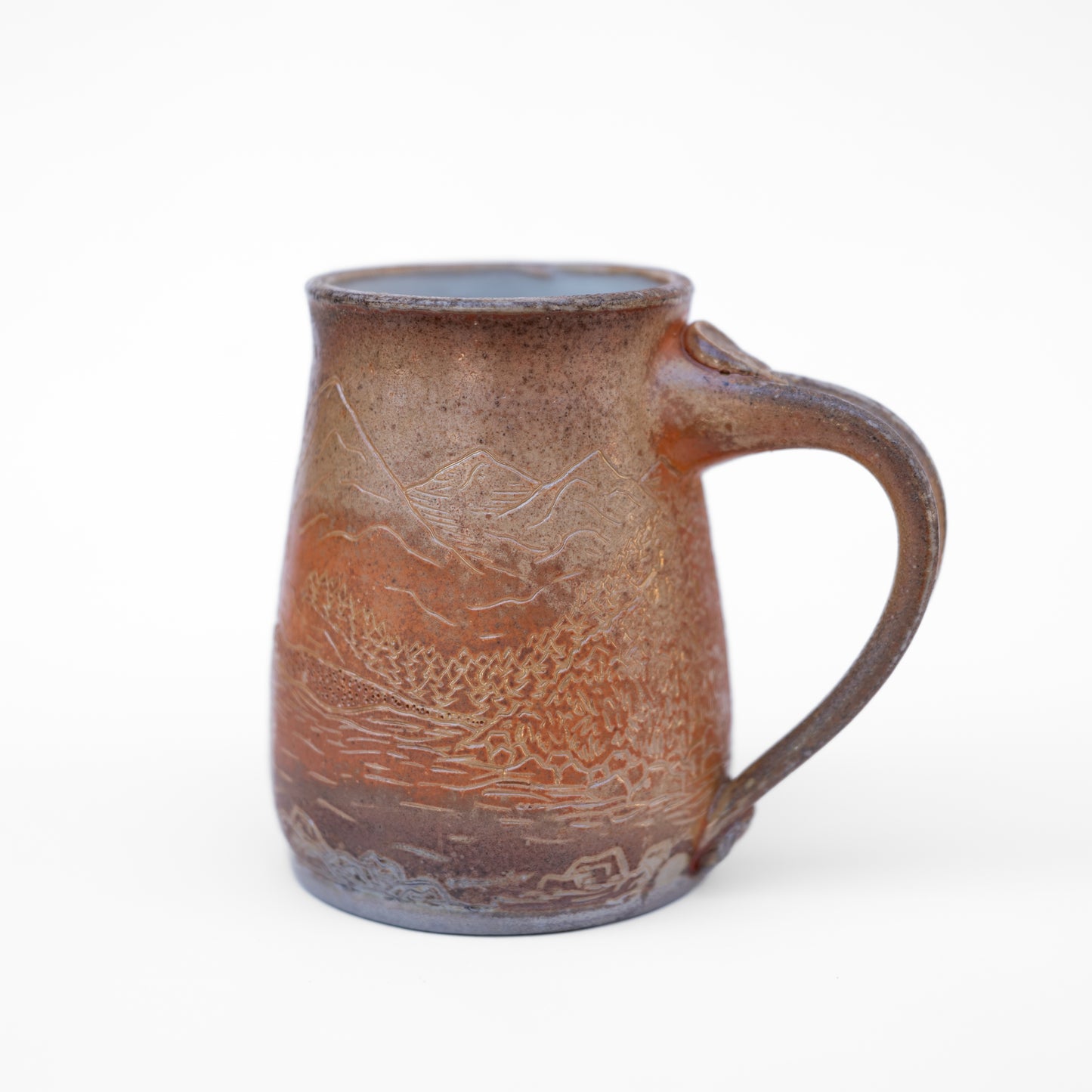 soda-fired sgraffito stein mug