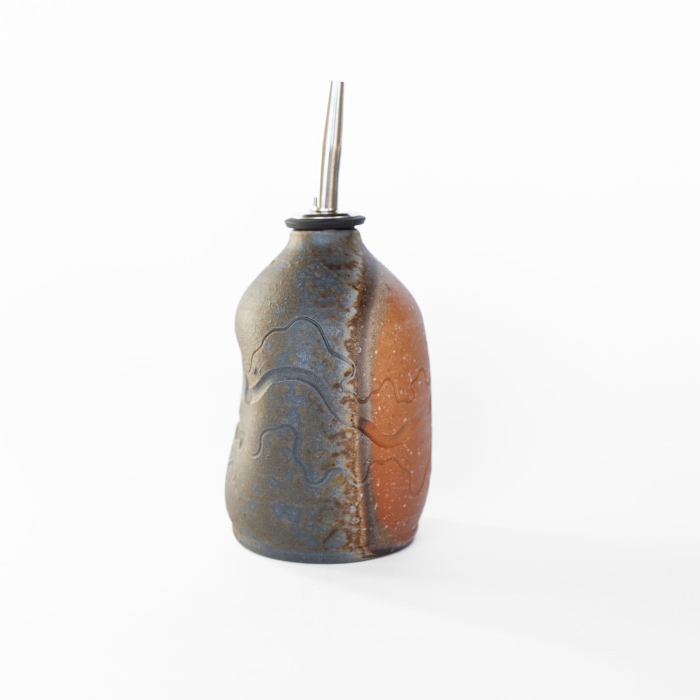 wood-fired sgraffito oil bottle