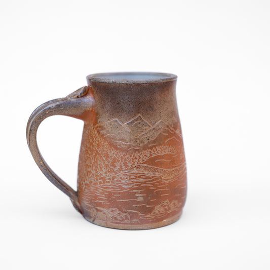 soda-fired sgraffito stein mug
