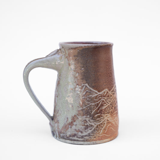 soda-fired sgraffito stein mug